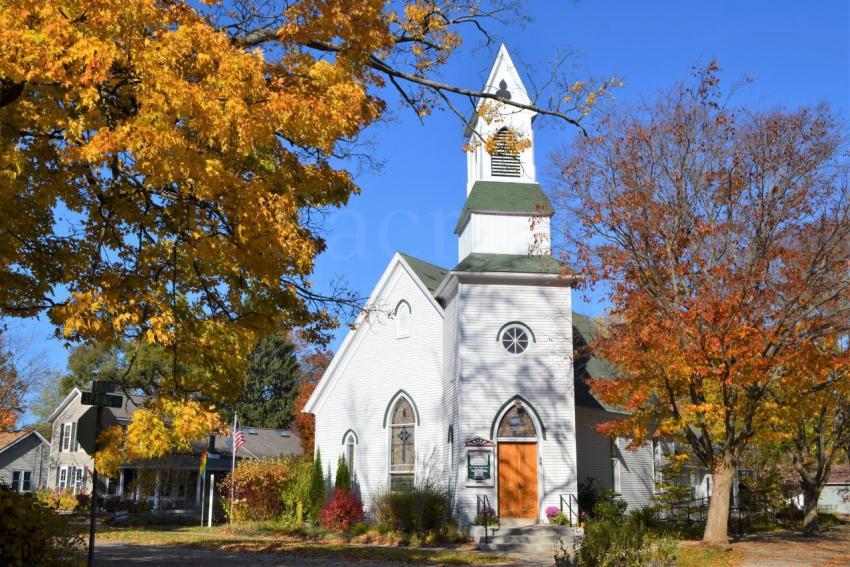 a beautiful church in small town usa in the fall